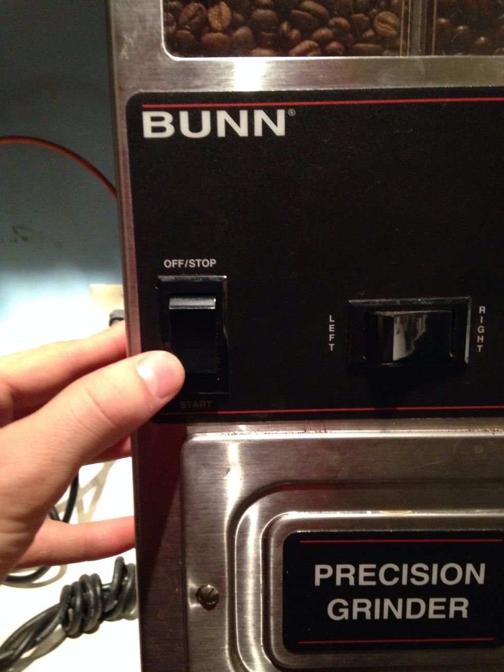 Press start. The grinding will start - let it run until it stops.