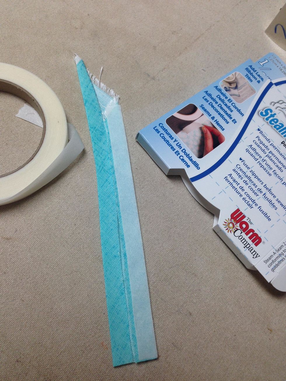 Press SteamASeam2 to the seam allowance on only one side of the 6\u201d and the 11" strips as shown.