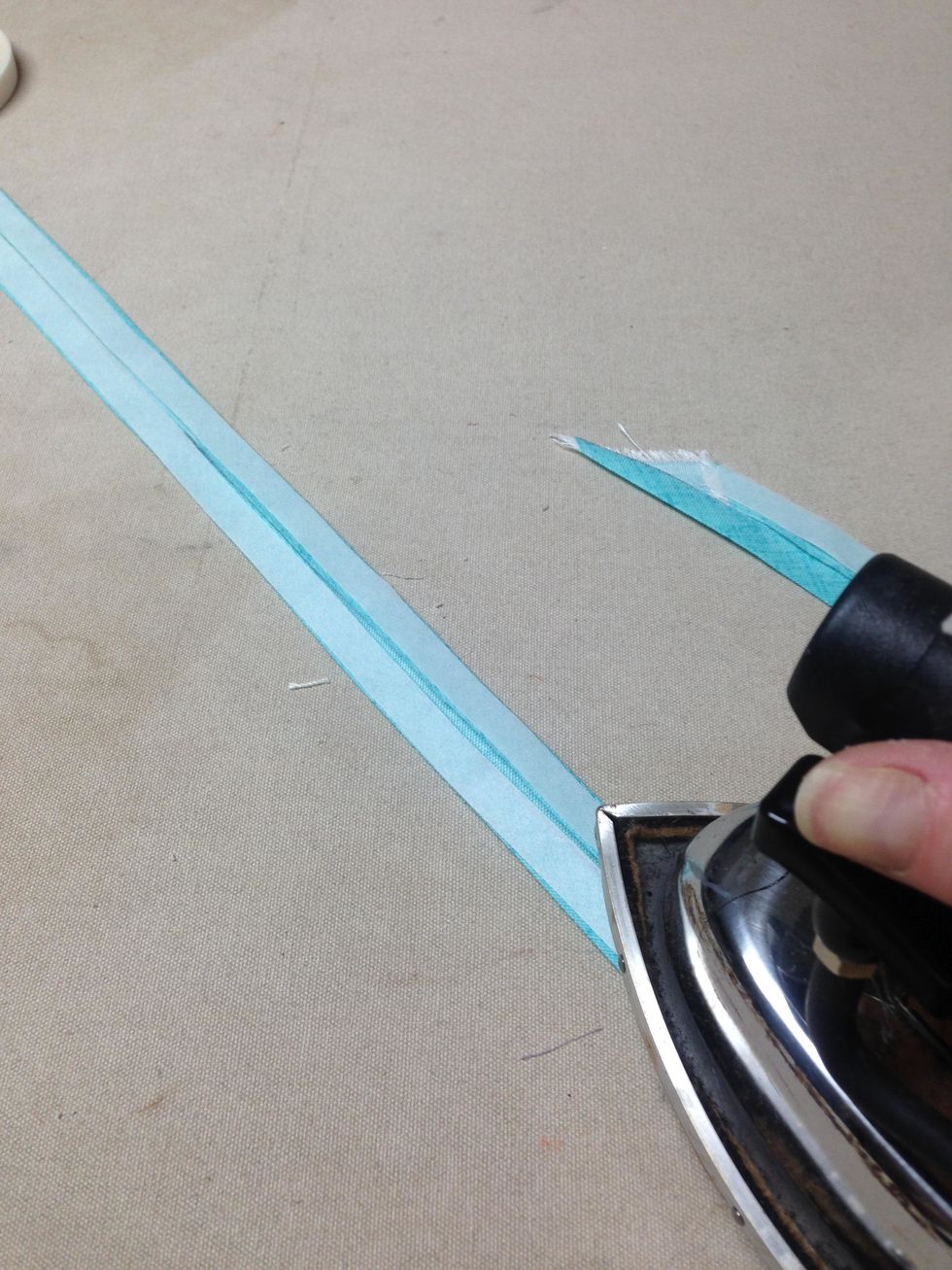 Press SteamASeam2 to the seam allowances of both sides of the 28\u201d and 15\u201d strips.  Here's an informative video from our website about SteamASeam2  http://www.patemeadows.com/steamaseam2.htm