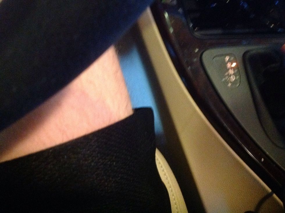 Press the brake, and put the vehicle in reverse