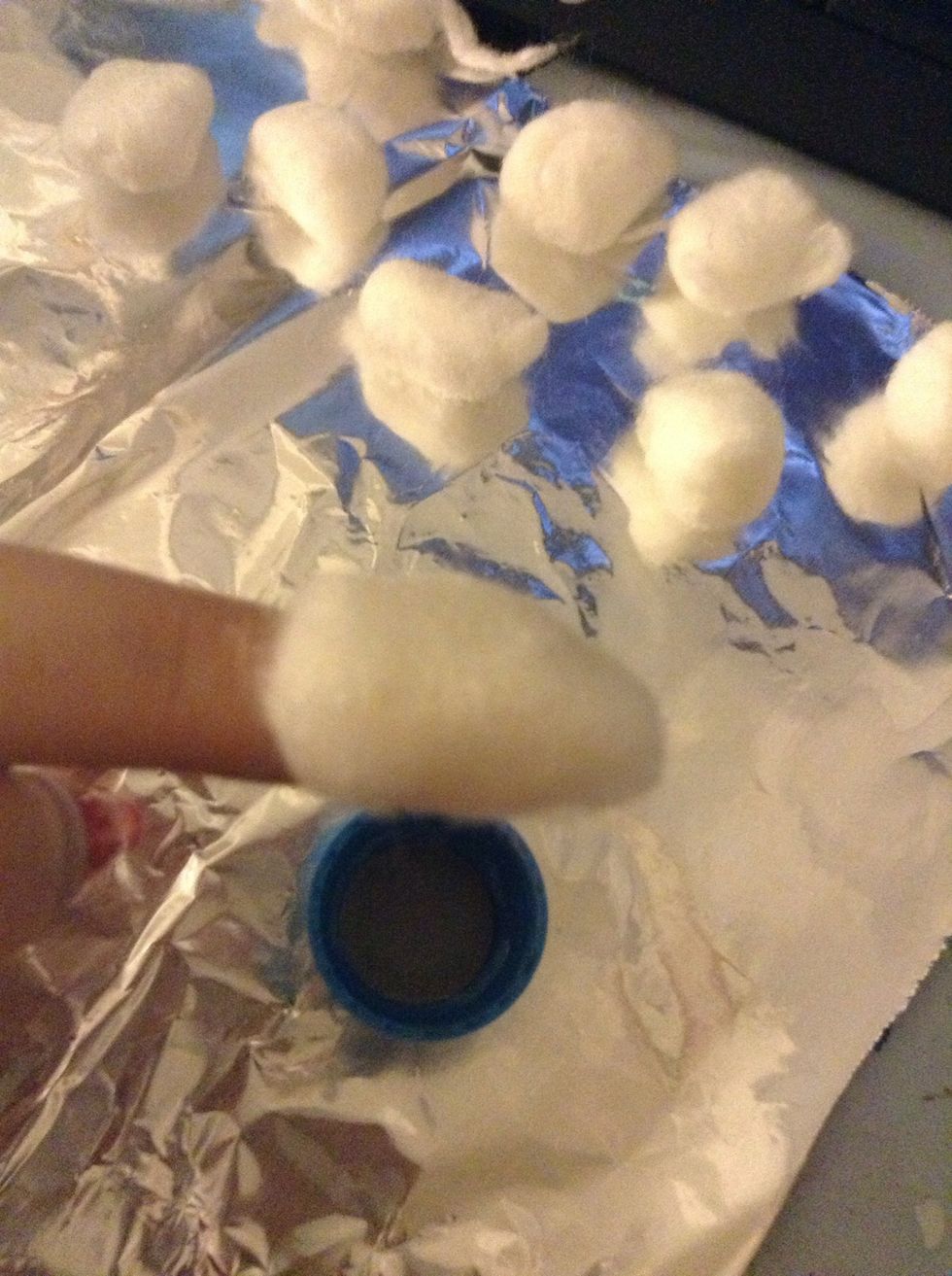 Press the cotton ball onto your nail.