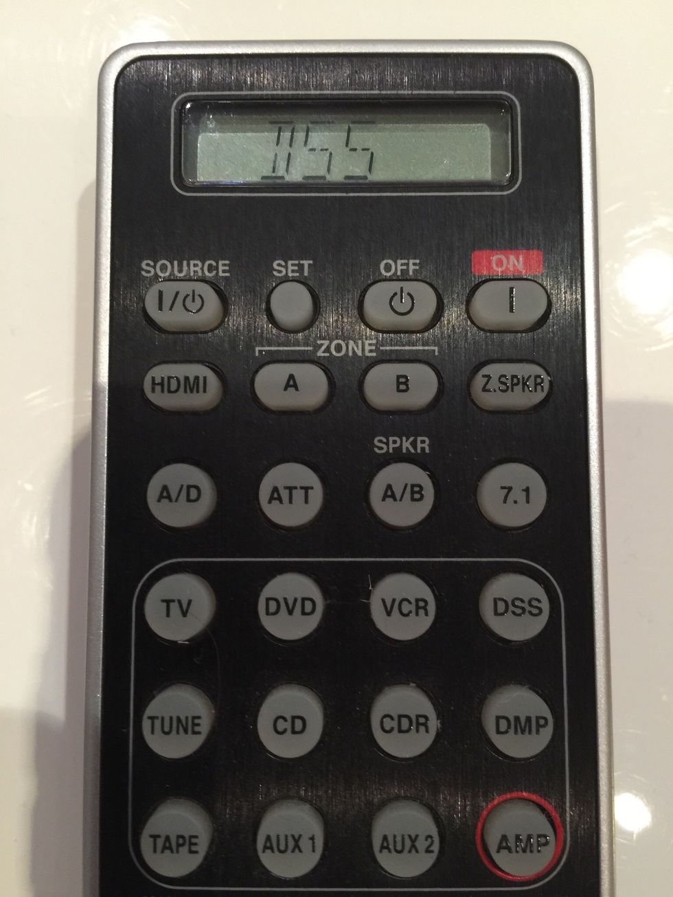 Press the DSS button so that DSS shows on the remote. Now point the remote at the YouView box in the cupboard and press the Source / Power button again (top left). The YouView light should be blue.
