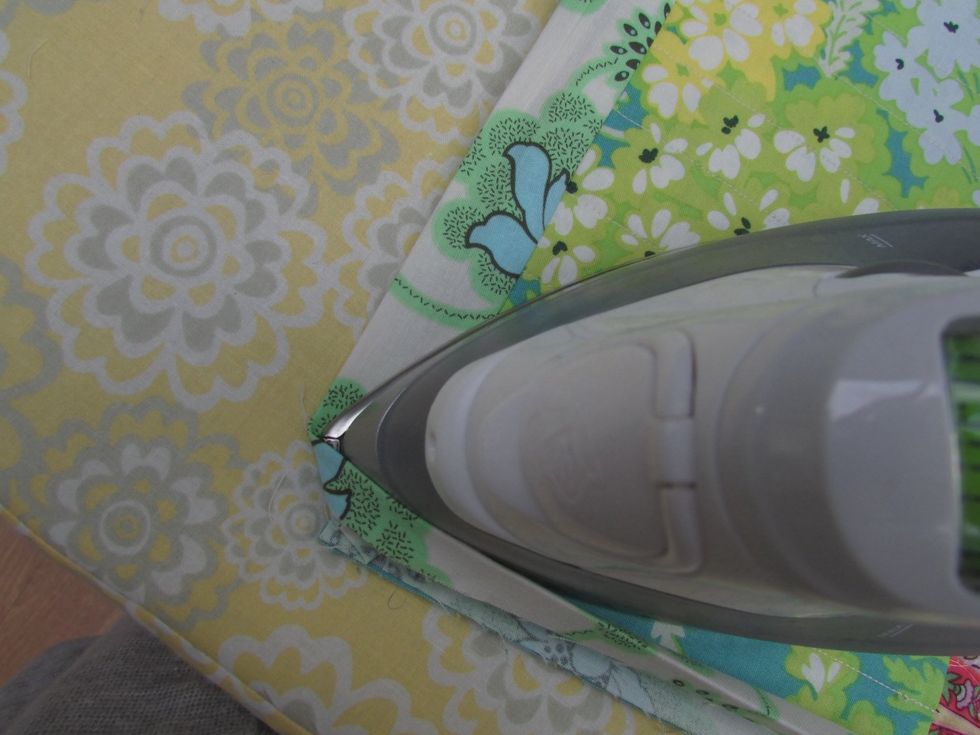 Press the edging away from the inside, pressing corners open.