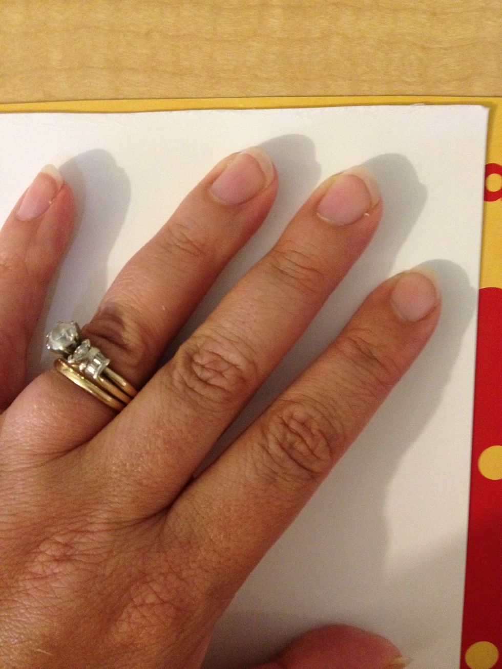 Press the glued side down onto the box leaving a narrow edge.