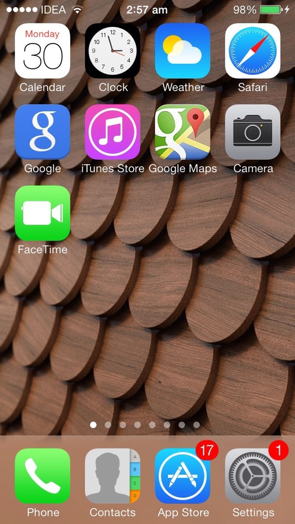 Press the Home button to launch the phone's home screen. As you know, the dots on the top left corner of the screen indicate signal strength.