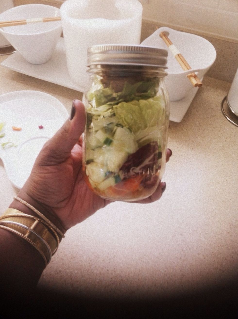 Press the lid down and tighten. Mason Jars are virtually spill proof, but I recommend not tilting your jar or turning it upside down until you're ready to eat. Remember there's dressing at the bottom!