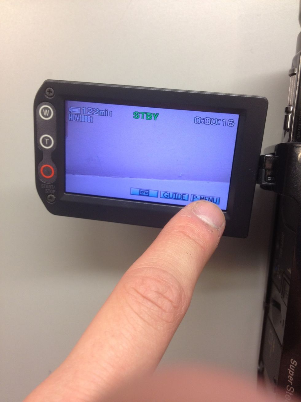 Press the P-MENU button on the screen.