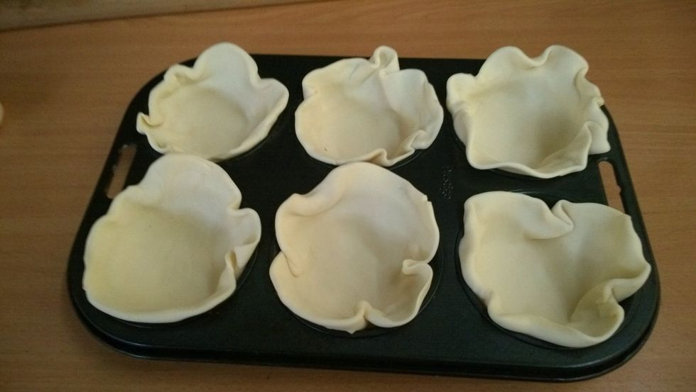 Press the pastry into the tin..