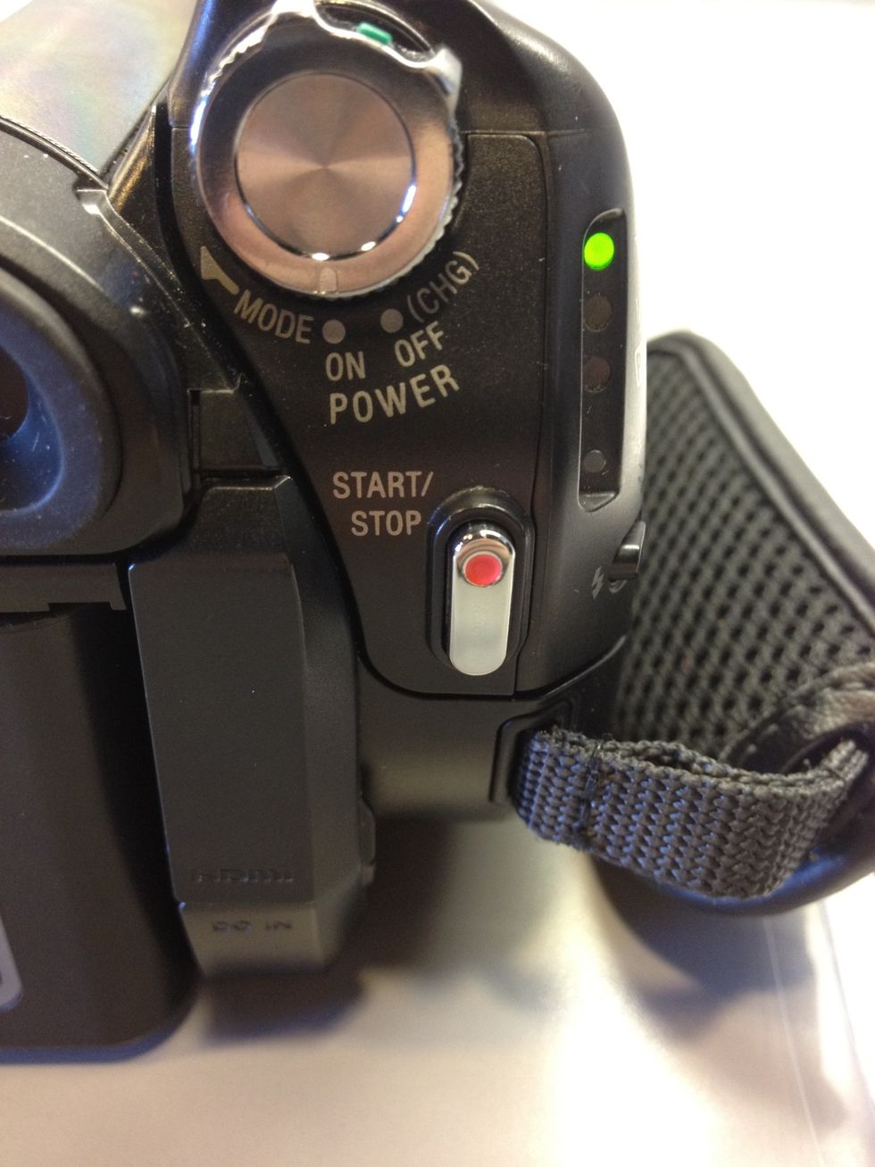 Press the red button to begin recording.