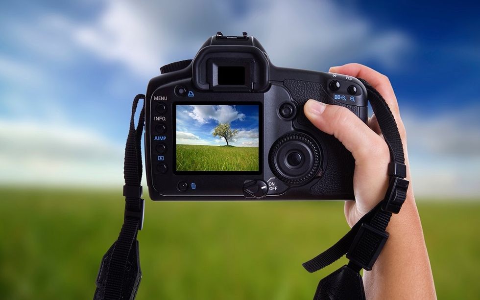 Press the shutter all the way down until you hear a beep