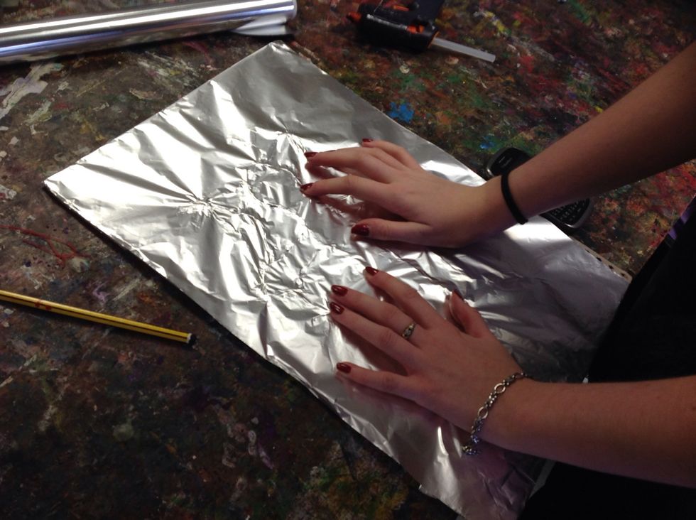 Press the tinfoil gently and try not to rip it