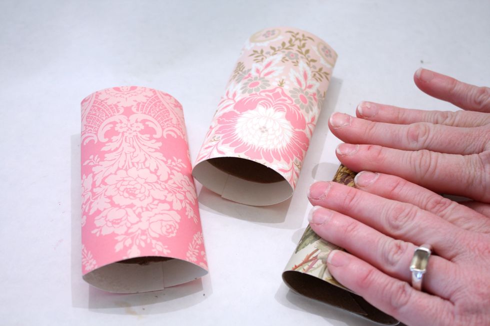 Press them down a little flat (don't press too hard of you used the Xyron or it will stick together)