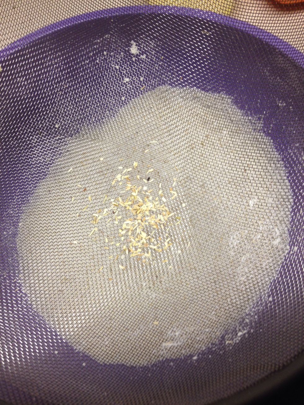 Press through as much of the powder as possible and only discard what won't go through the sieve
