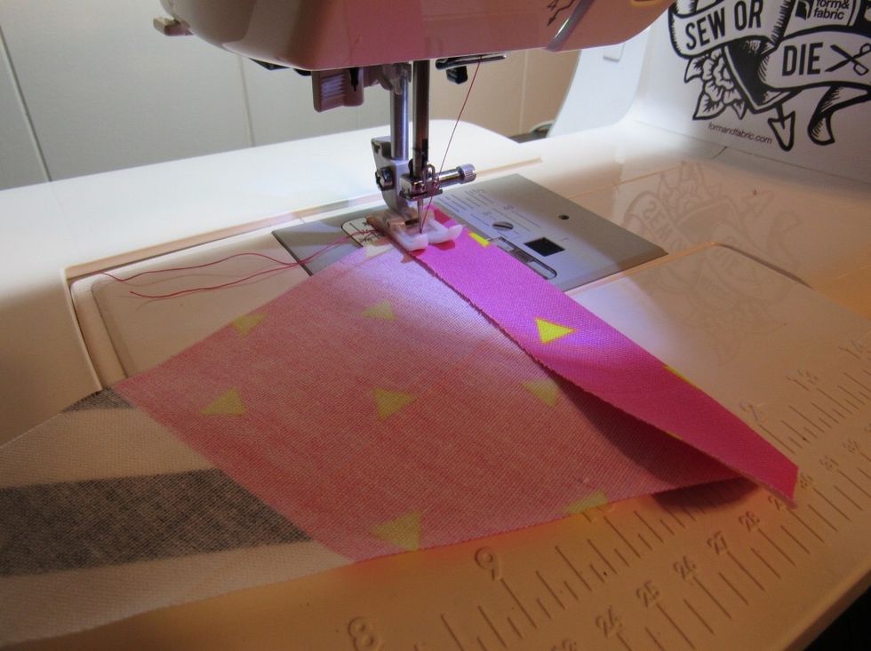 Press with iron or pin with sewing pins \u2013 I recommend pressing with the iron, it\u2019s much easier to sew it. Use about 1/4 seam allowance and sew each pennant flag.
