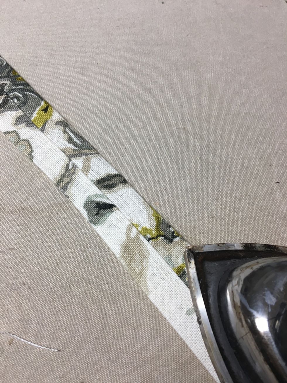 Press with seam just to the side of the center of the tube.