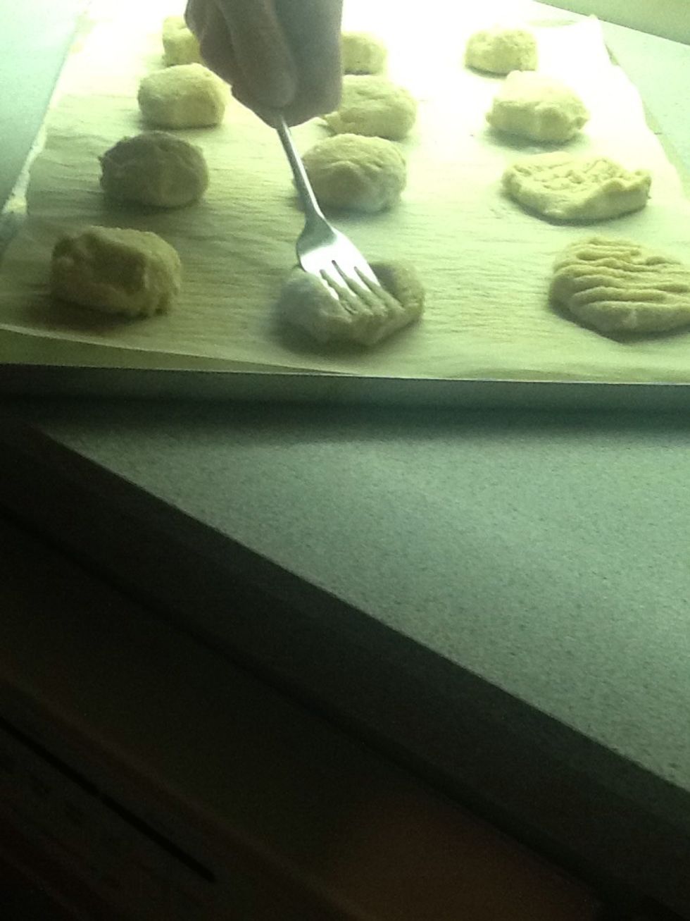 Press your cookies down with a fork.