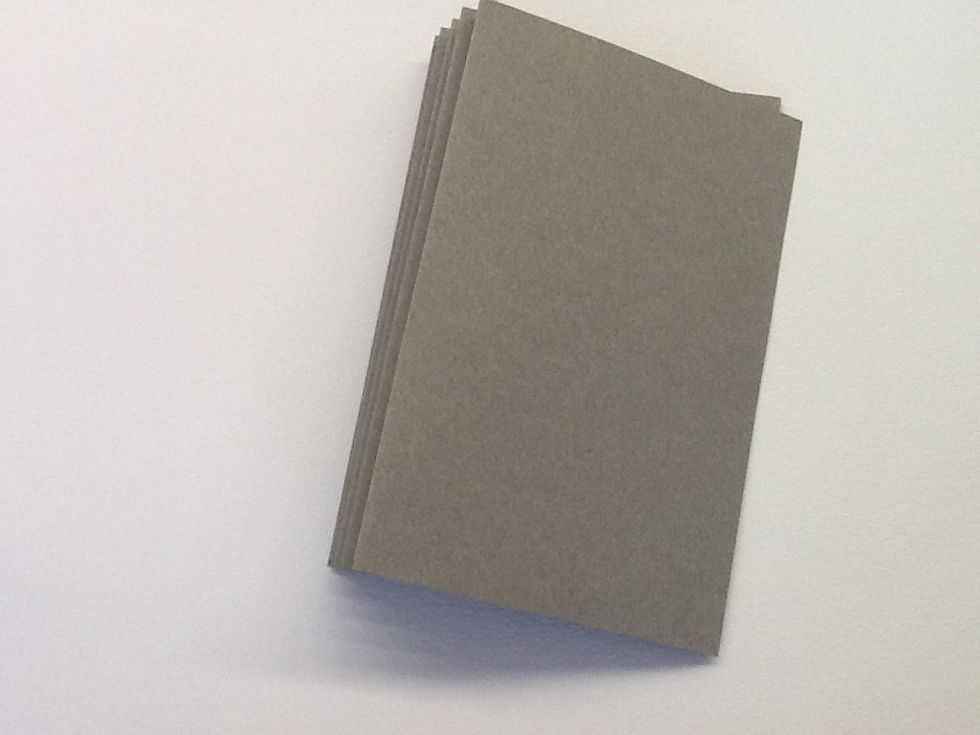 Press your spine down and add pressure to flatten your book into shape.