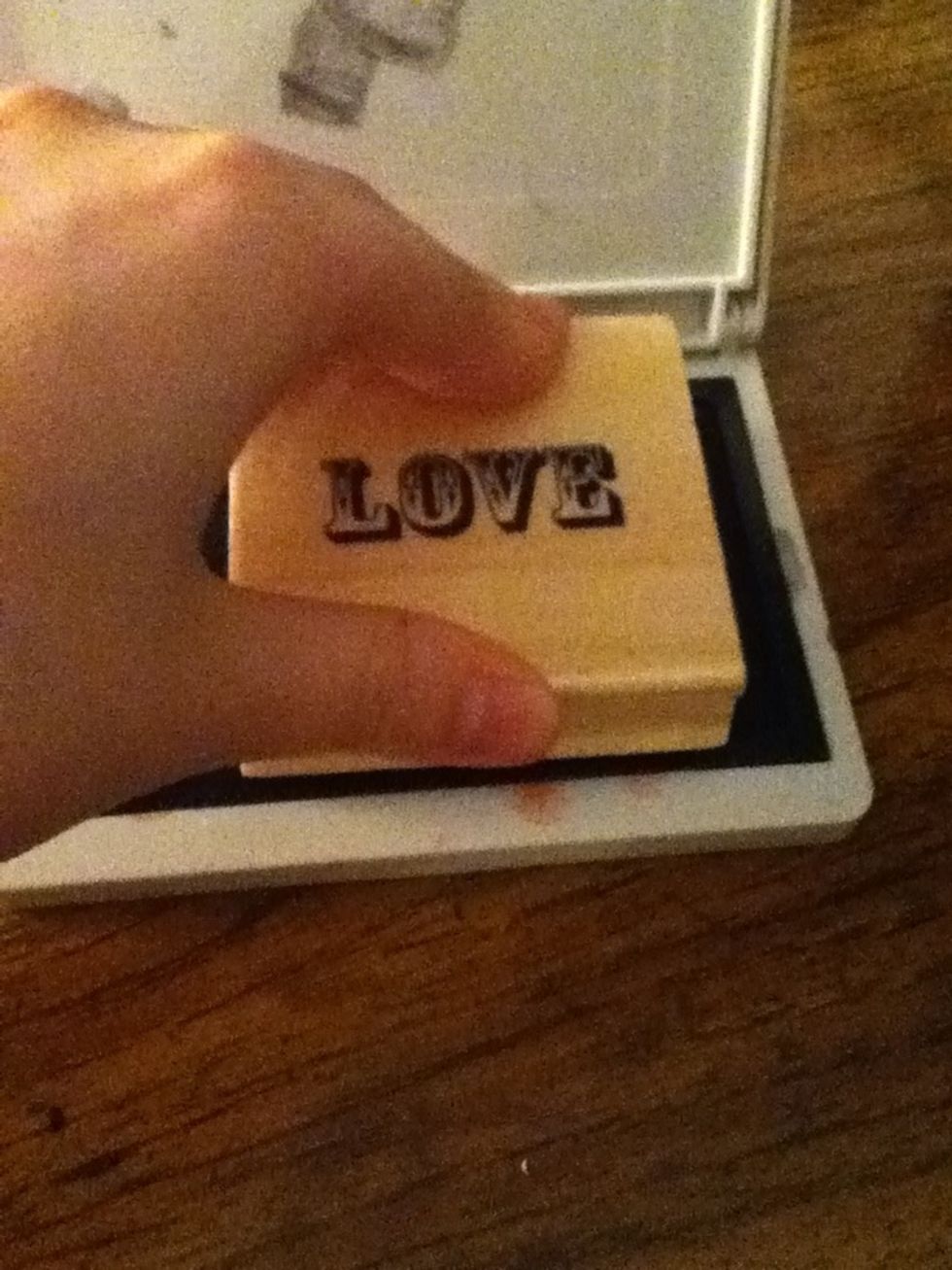 Press your stamp onto the pad