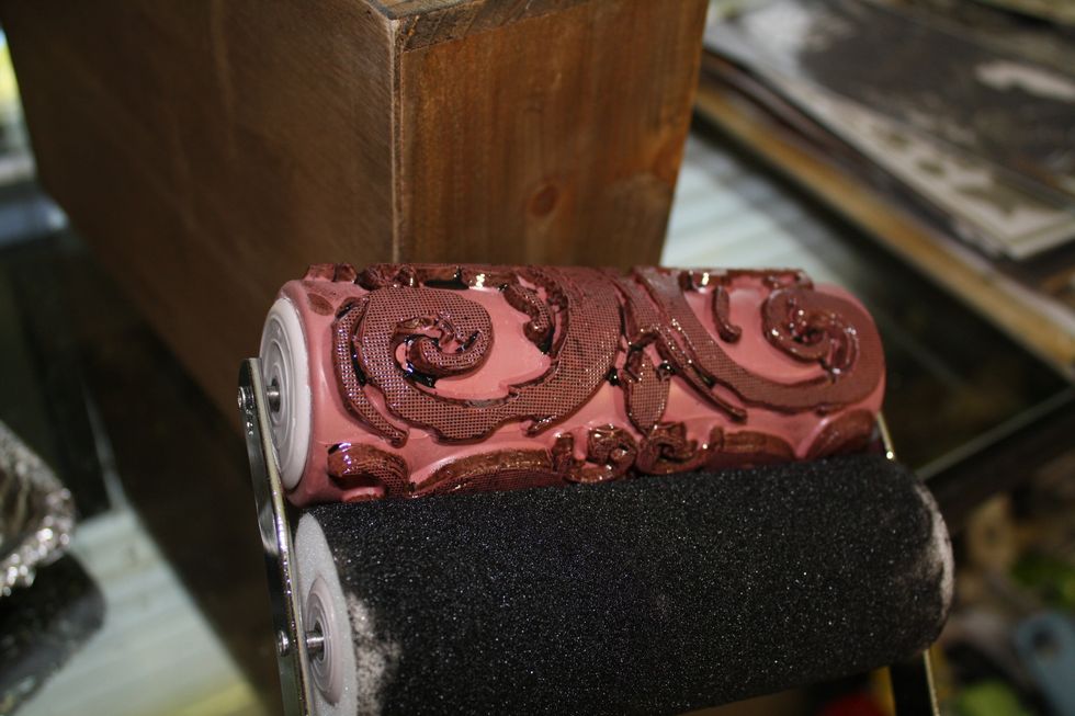 Pressing firmly , starting from the bottom , I roll upward with my Roller Stamp. It is a very easy process!