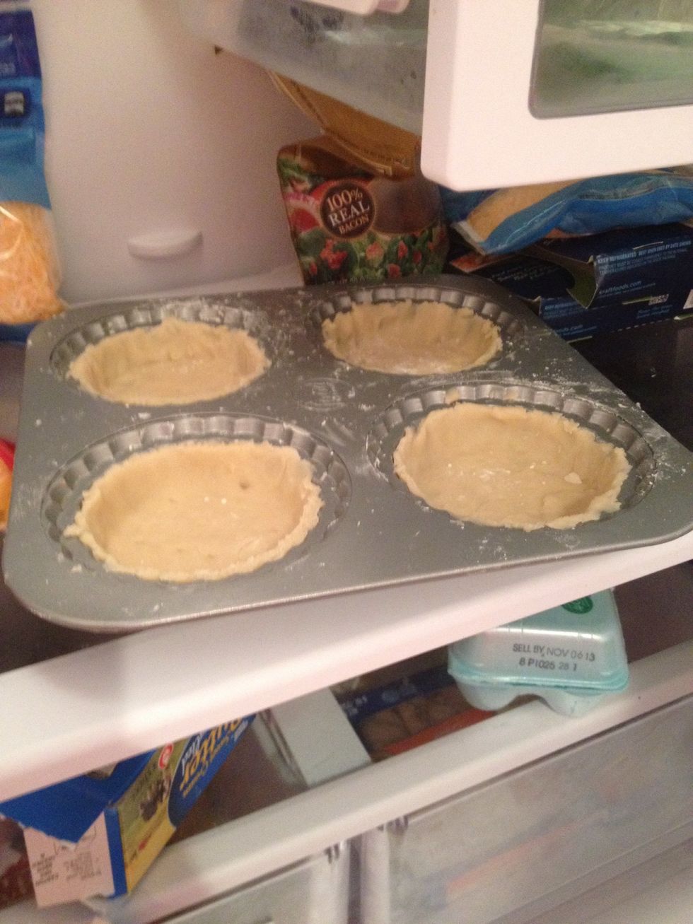 Prick the bottom of the tarts with a fork and place in the fridge to chill for 20 mins