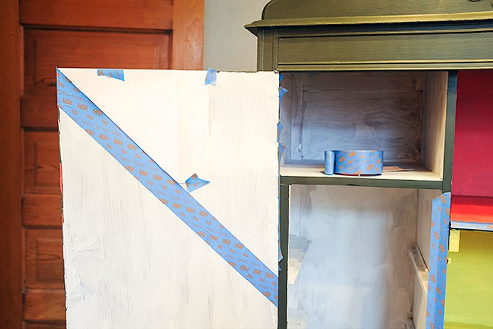 Prime the surface you'll be painting, and let dry. Next, tape off your stripes!