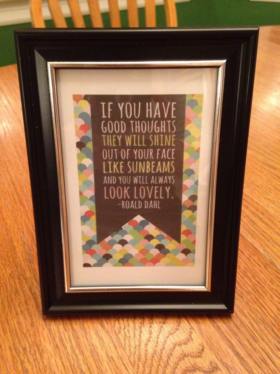Print a happy quote off the internet onto cardstock and place in a frame.