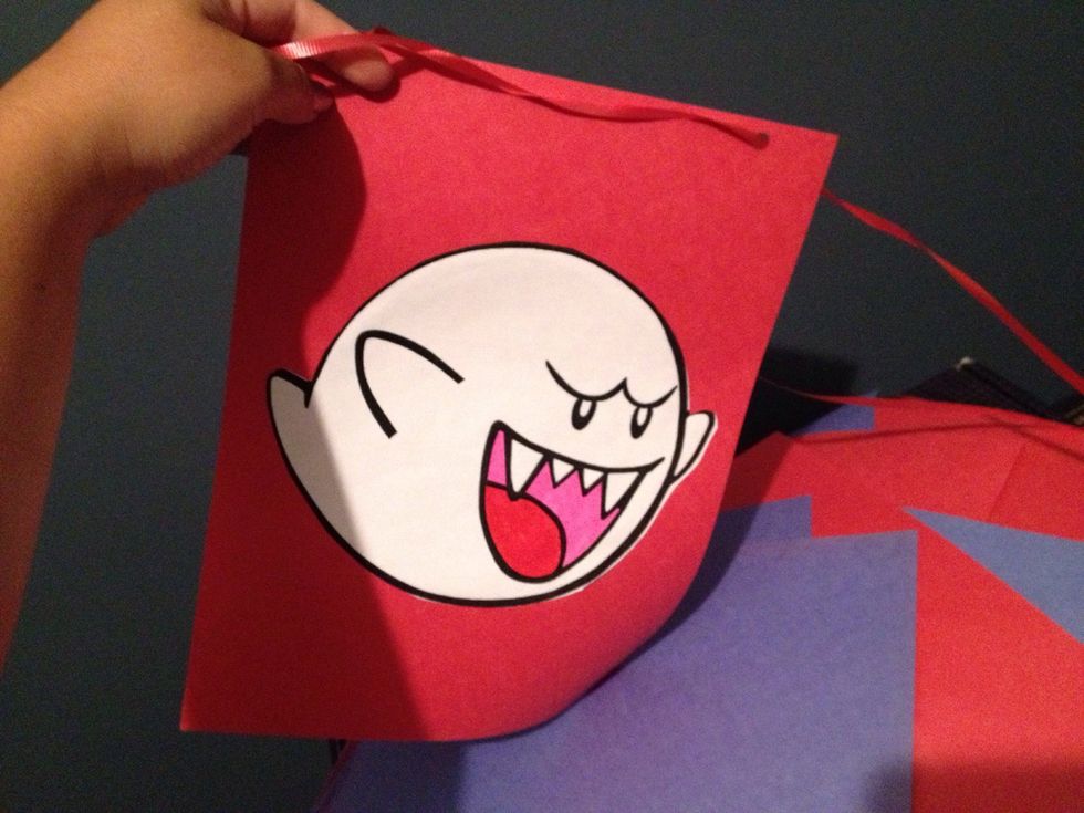 Print boo's image from the Internet. Cuts and color them to his likeness. Paste on construction paper using glue stick. To string together, use a hole punch. I used ribbon to string them together.
