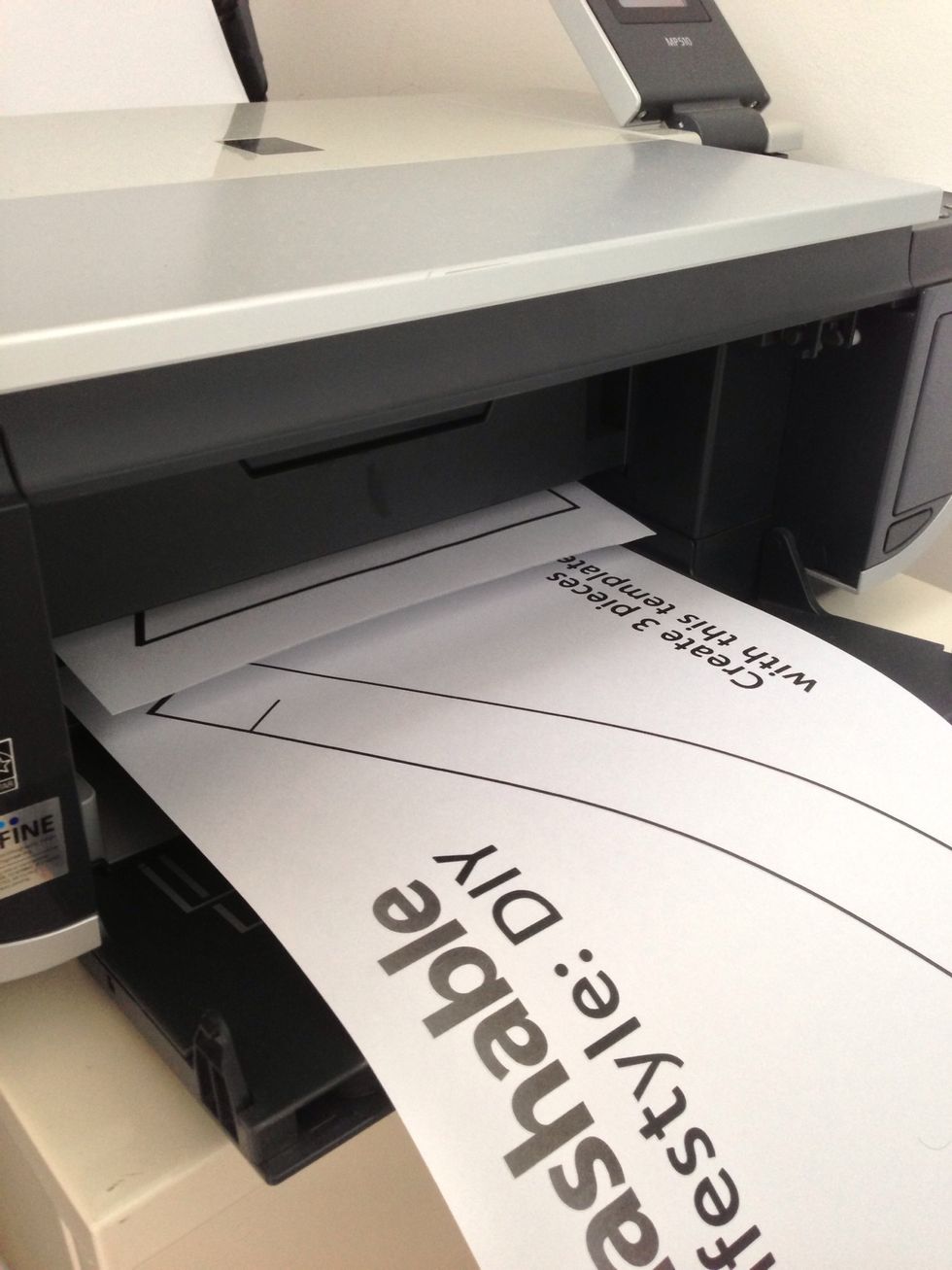 Print out the two templates from http://mashable.com/2012/10/13/cardboard-laptop-stand-diy/ on regular A4 paper.