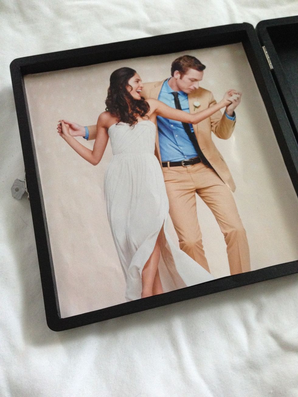 Print out your favorite engagement photo and trim it down to fit the left side of your box. Before placing in box affix glue dots to all four corners of your photo then firmly press into box.