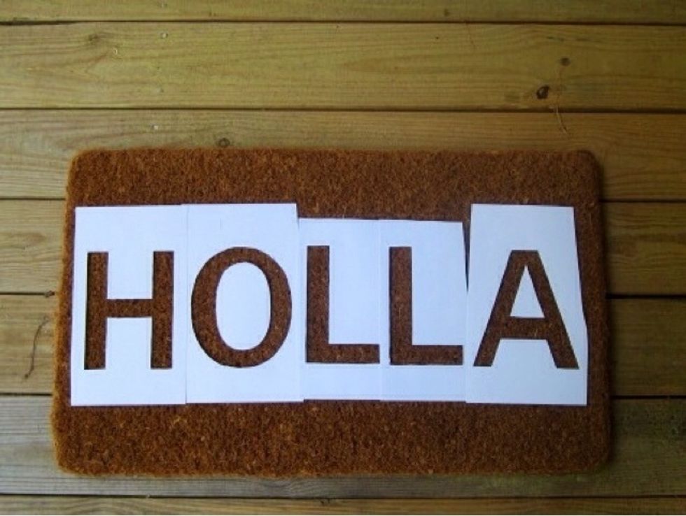 Print the letters you want to use on the card stock and cut them out using an exacto knife.