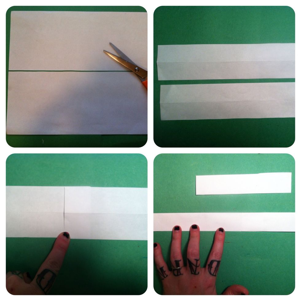 Printer paper. Cut in 1/2 long ways. Cut in 1/2 long ways again. Match the 2 ends together & glue. Fold in half & glue together. You can cut about 5 inches off the end. You now have a long strip.