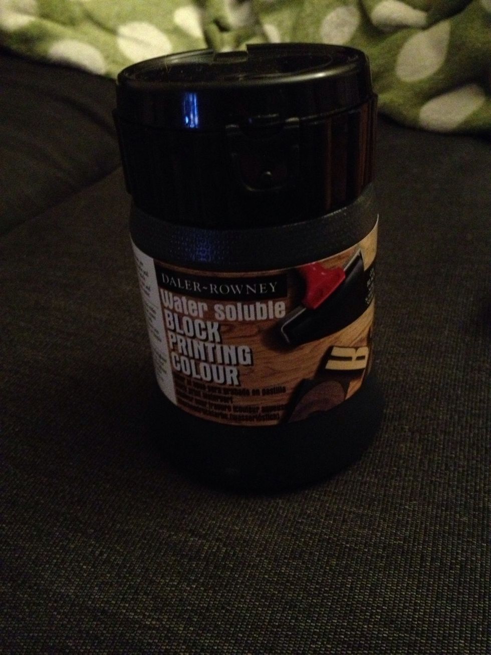 Printing ink. Comes in many colours, but you can also mix it. You can get either oil or h2O based versions; this is water based. Easy to clean up!