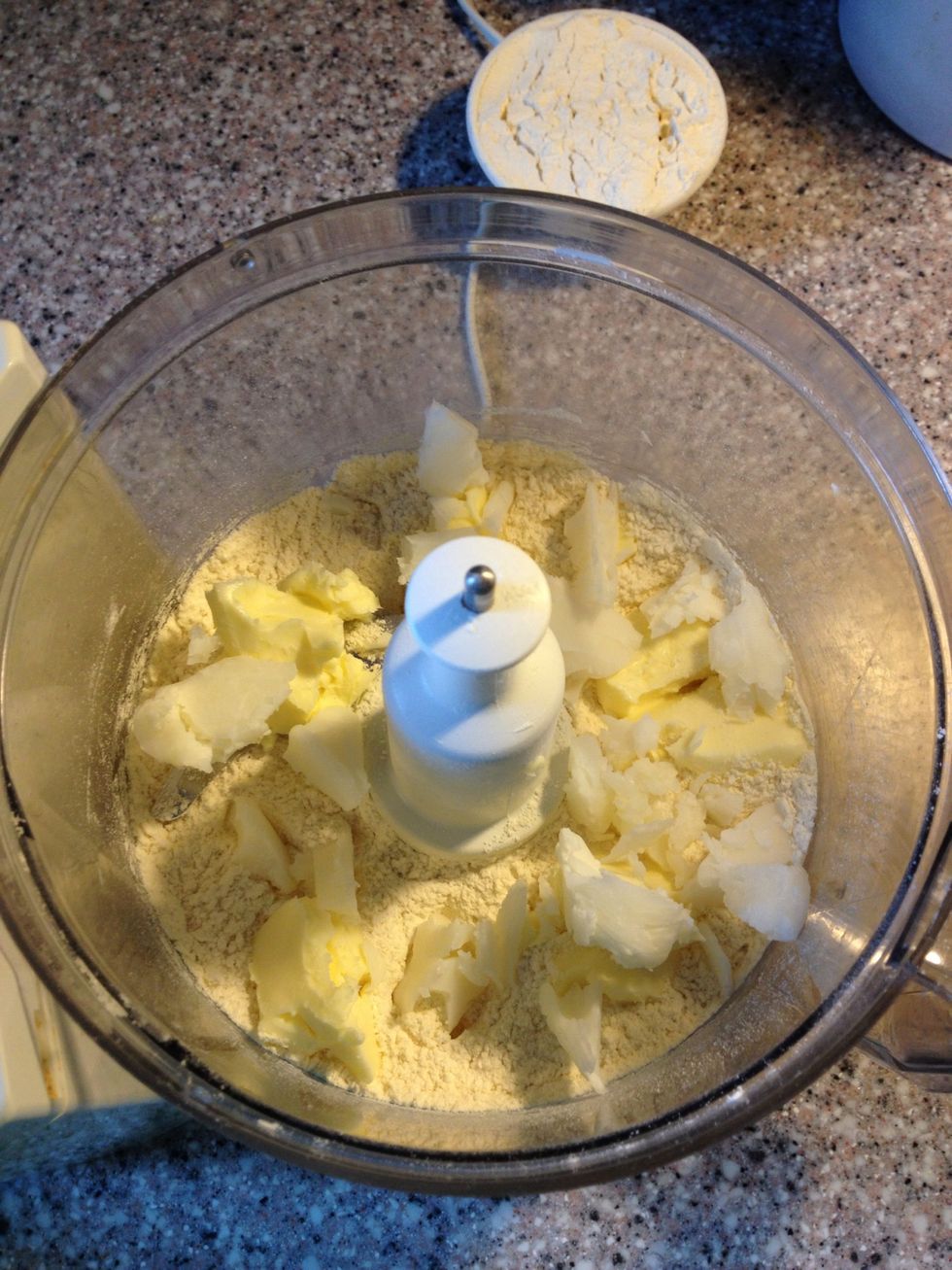 Process 3/4 cup flour, sugar and salt together until combined, 5 seconds. Scatter butter and shortening over top and process for 10 -12 seconds.