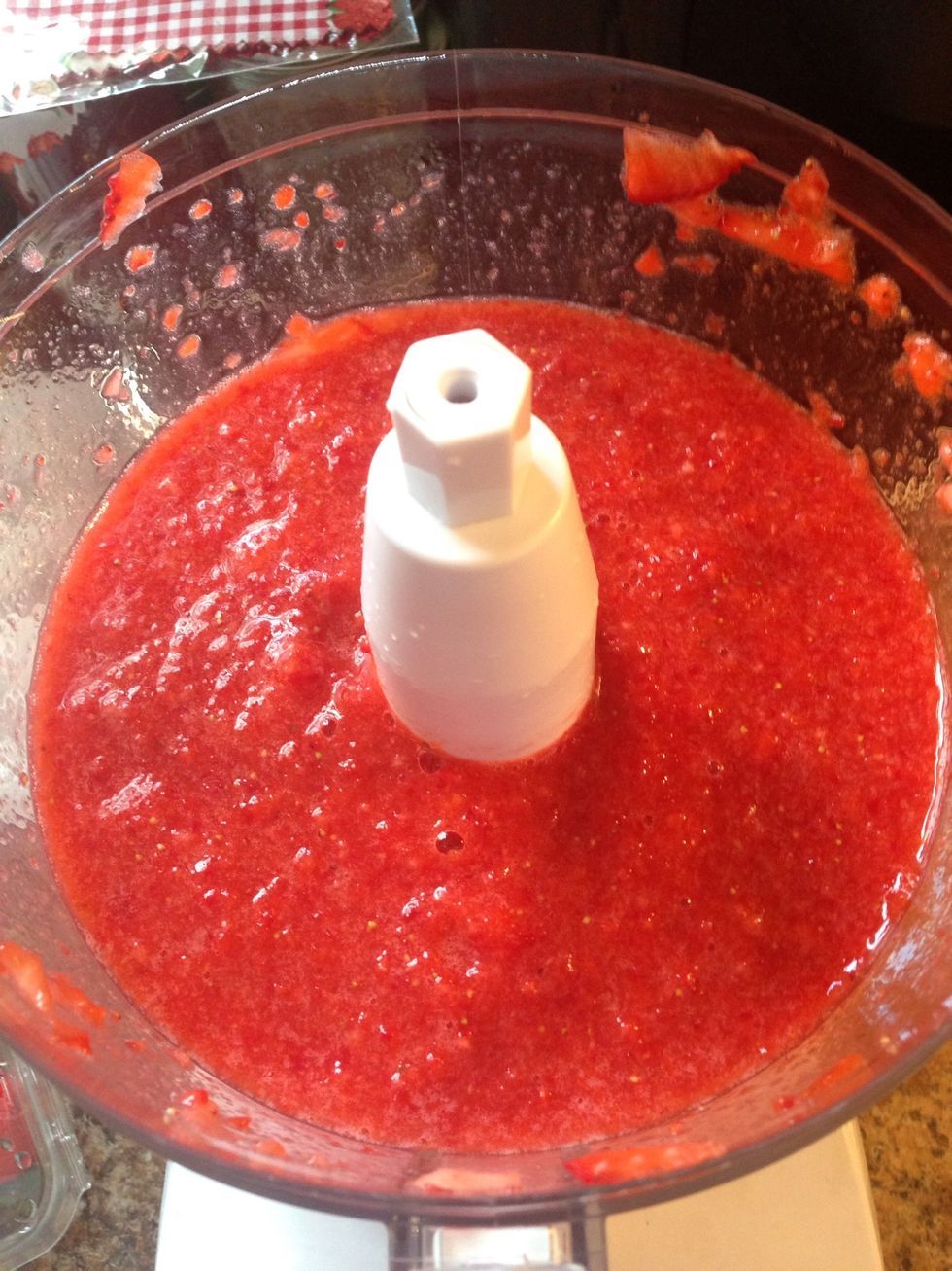 Process to desired consistency. One full processor container is about 2.5 lbs of berries. If you have extra cut then up sprinkle with sugar and enjoy later.