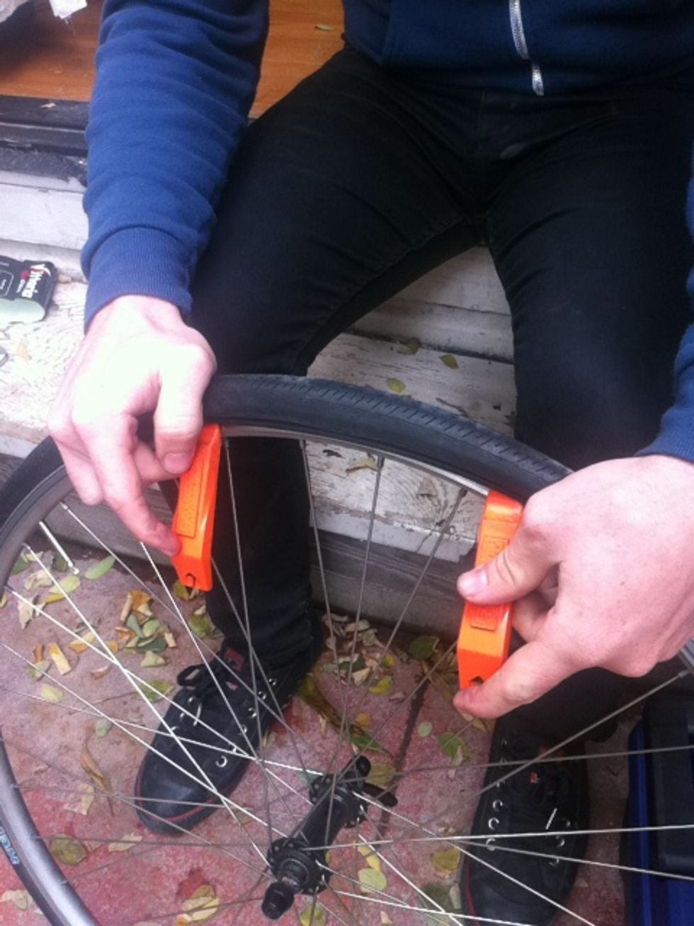 pry the tire from the rim