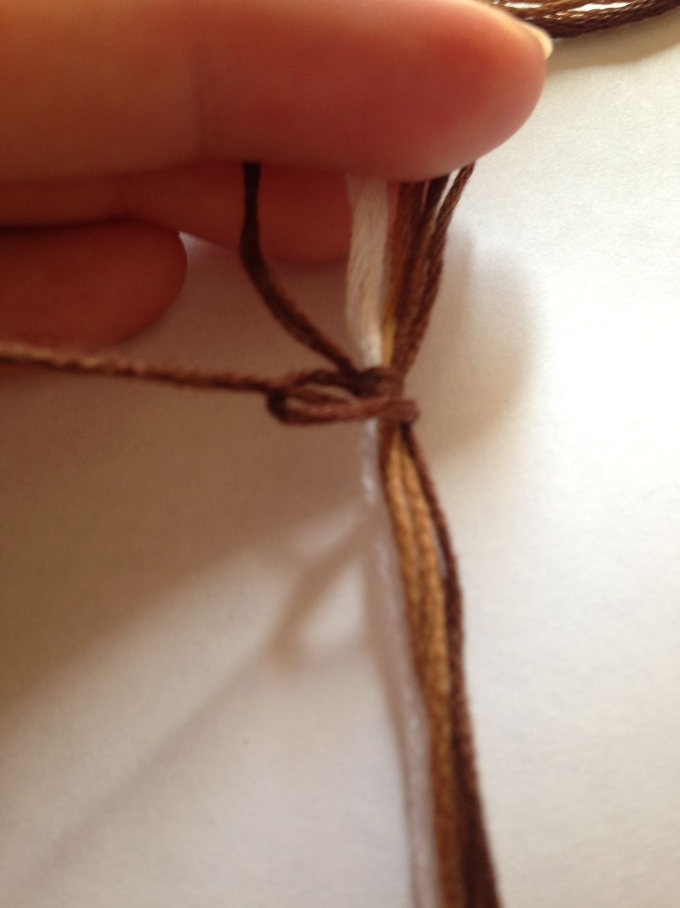 ... pull and tighten the string back up to the original knot.