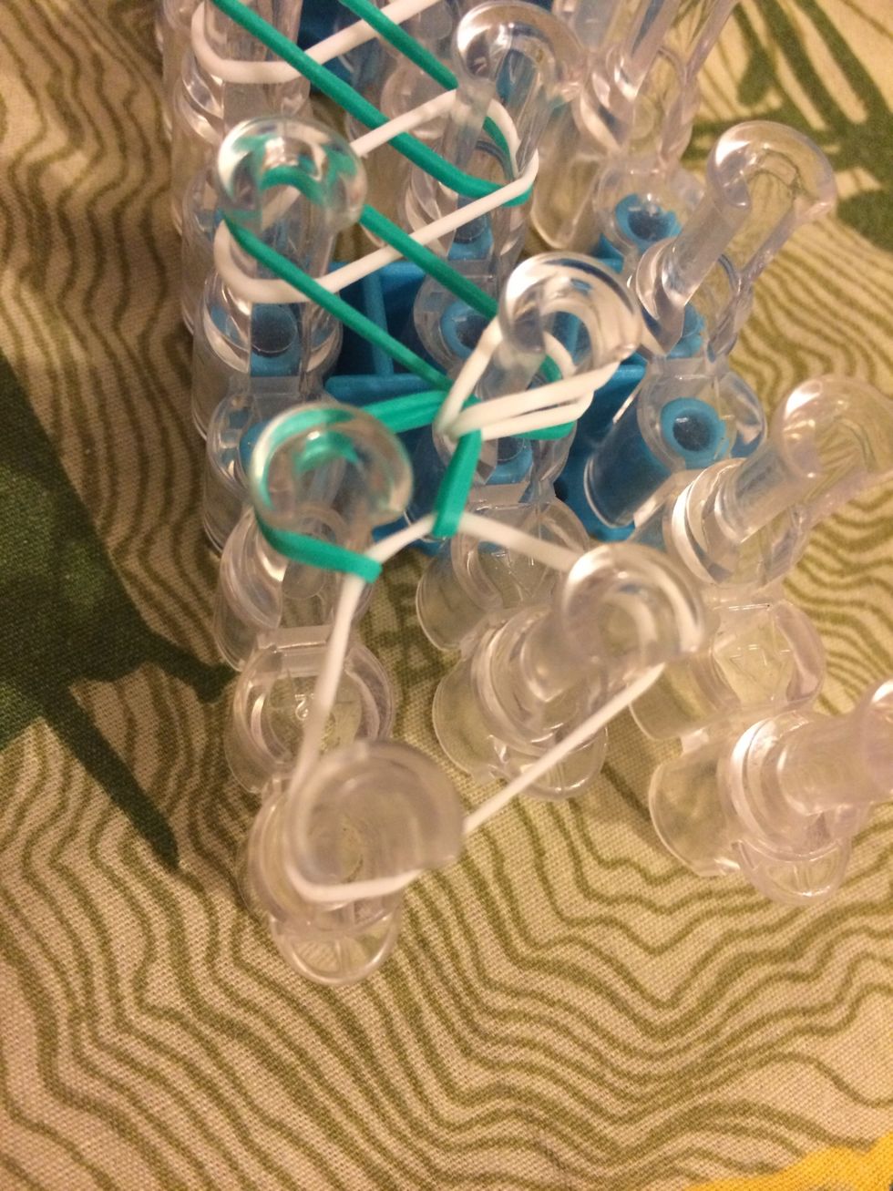 Pull back the 3rd band up to the adjacent pin