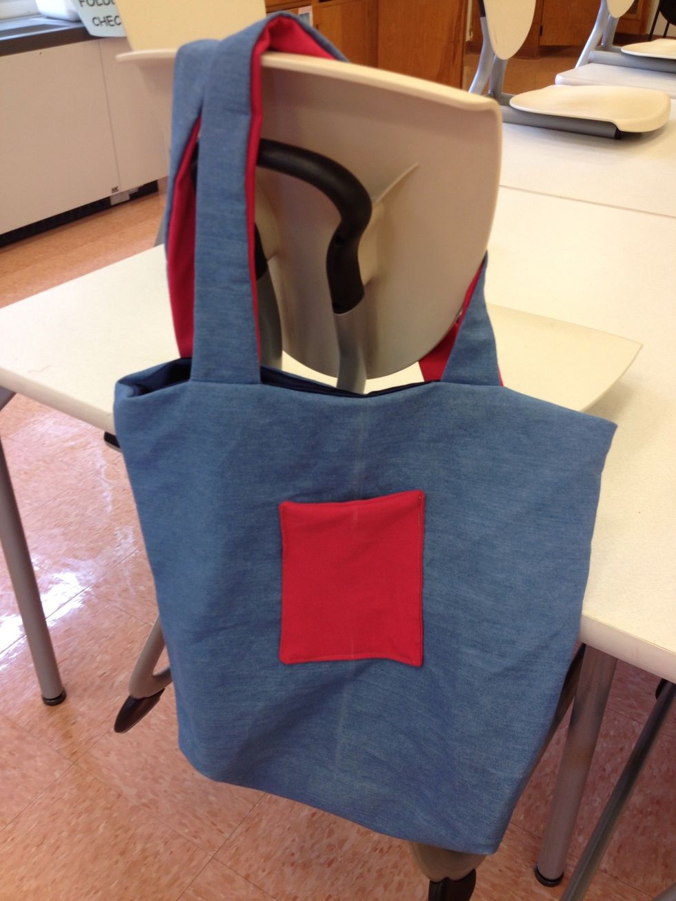 Pull bag right side out by straps through bottom hole.