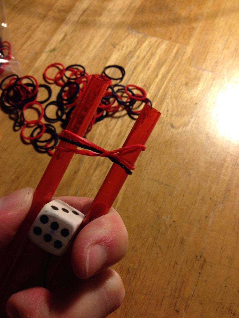 Pull bottom band over top two.