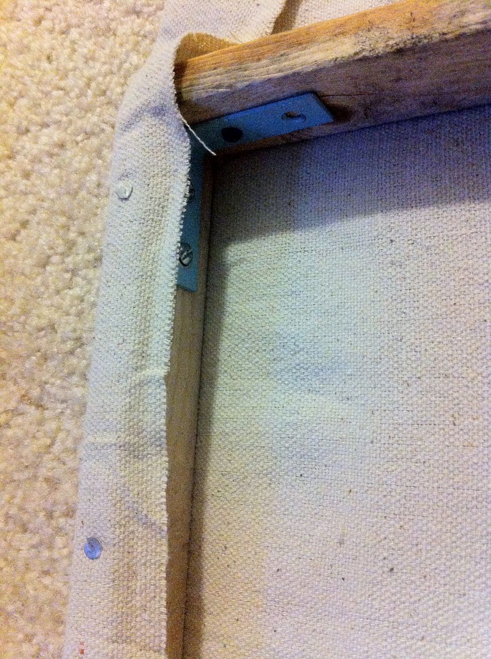 Pull canvas or fabric tight around your frame. Secure using staple gun or tacks.
