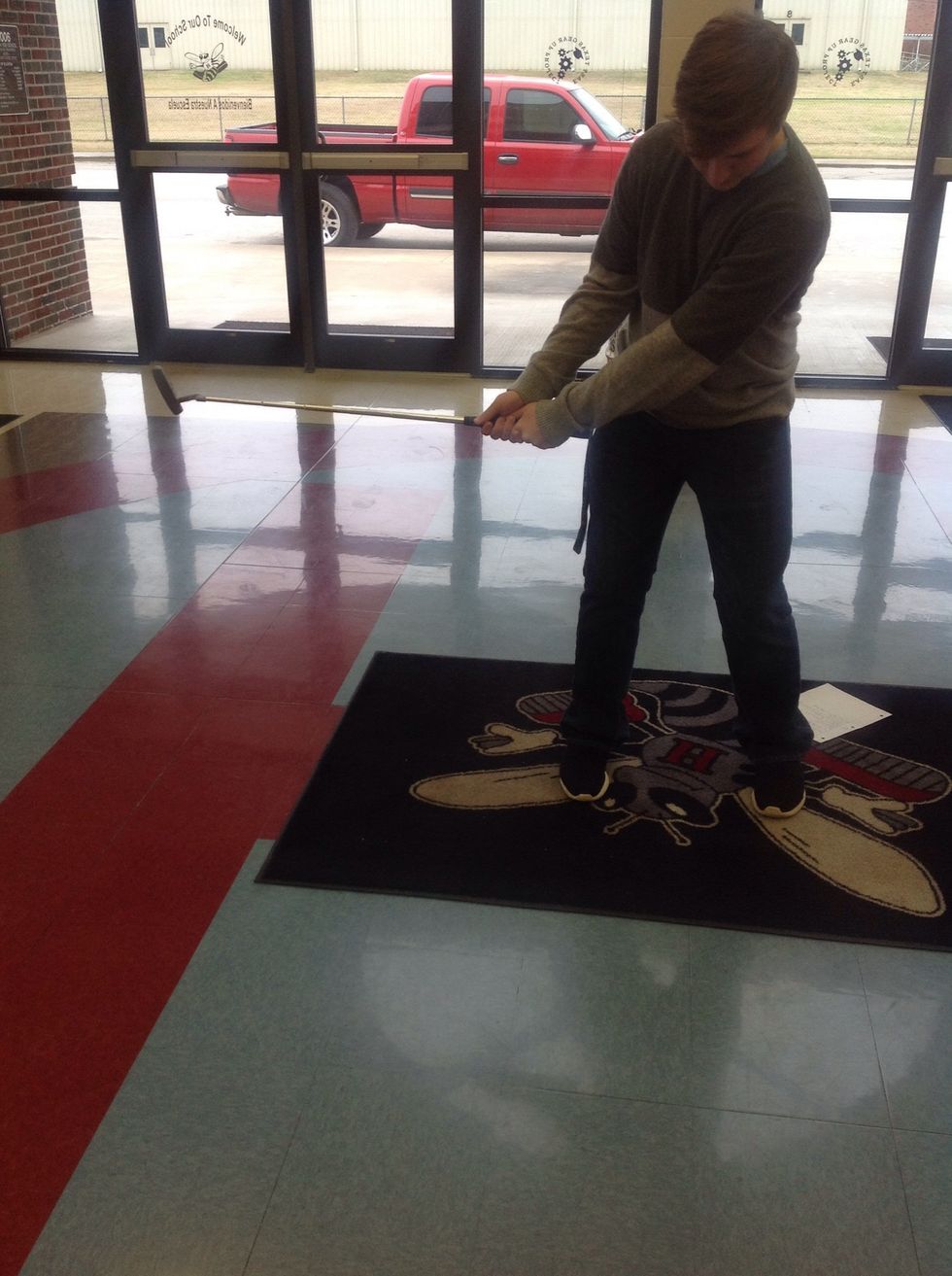 Pull club straight back and start to wind up your hips