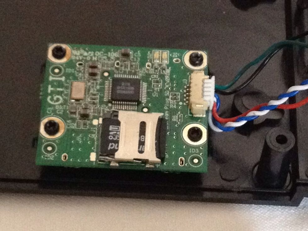 Pull cover right to lock.