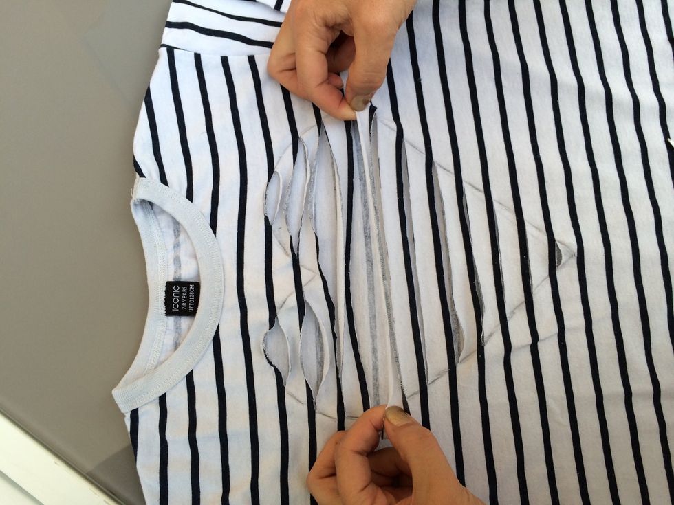 Pull each stripe from the sides to them tubular form.