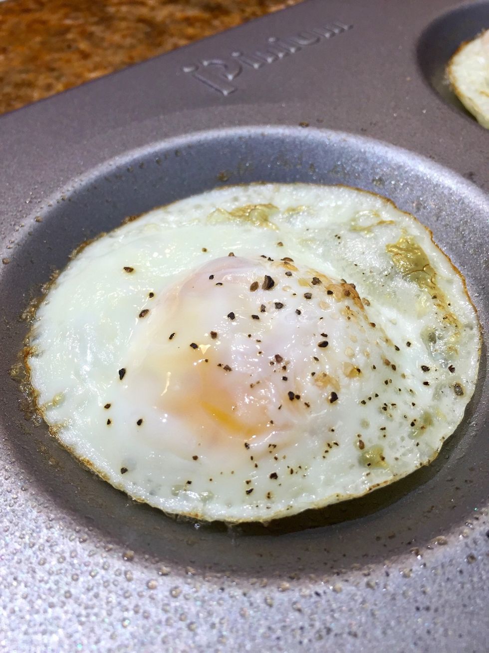 Pull eggs from the oven.