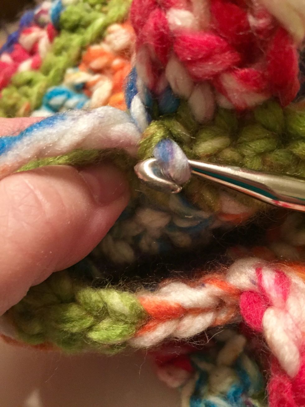 pull end through several loops inside bag to secure.