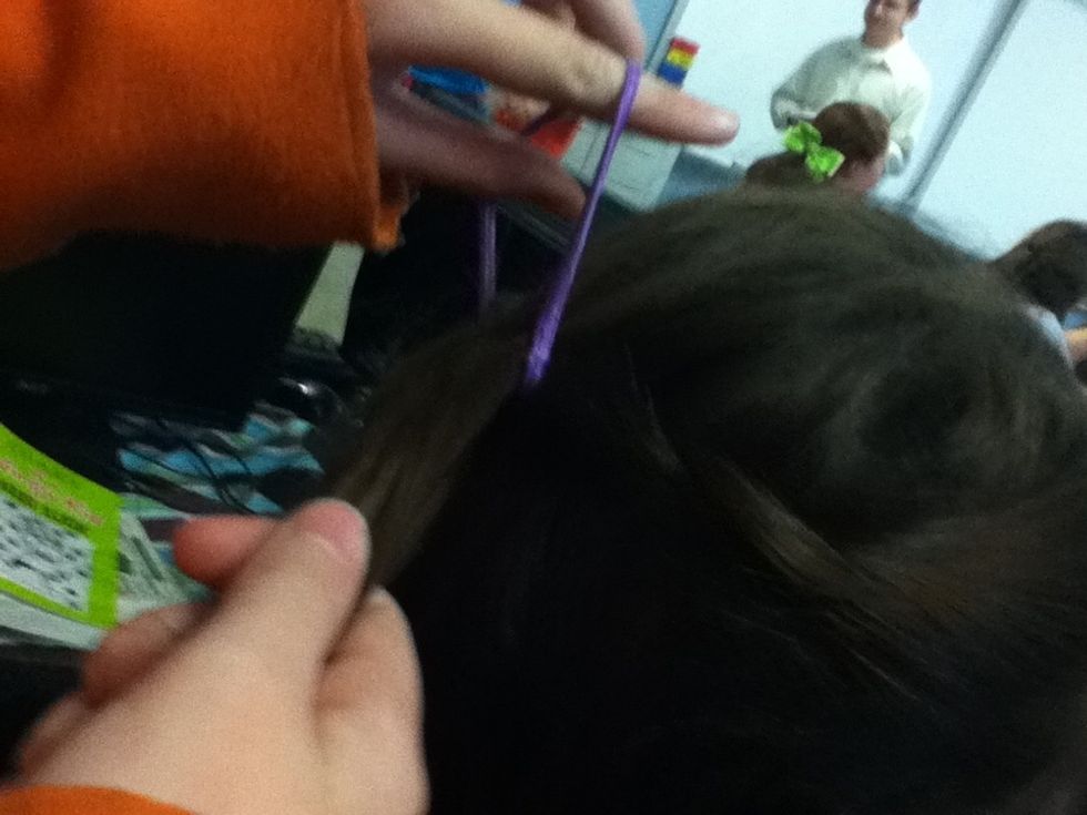 Pull hair band over the 2 pieces