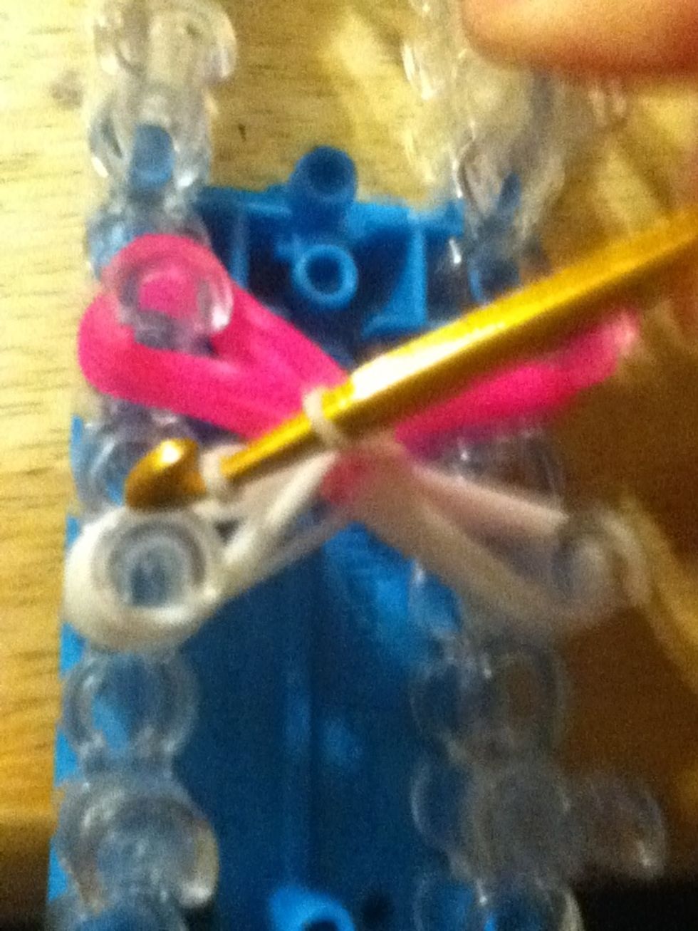 Pull halfway through and put other side on hook