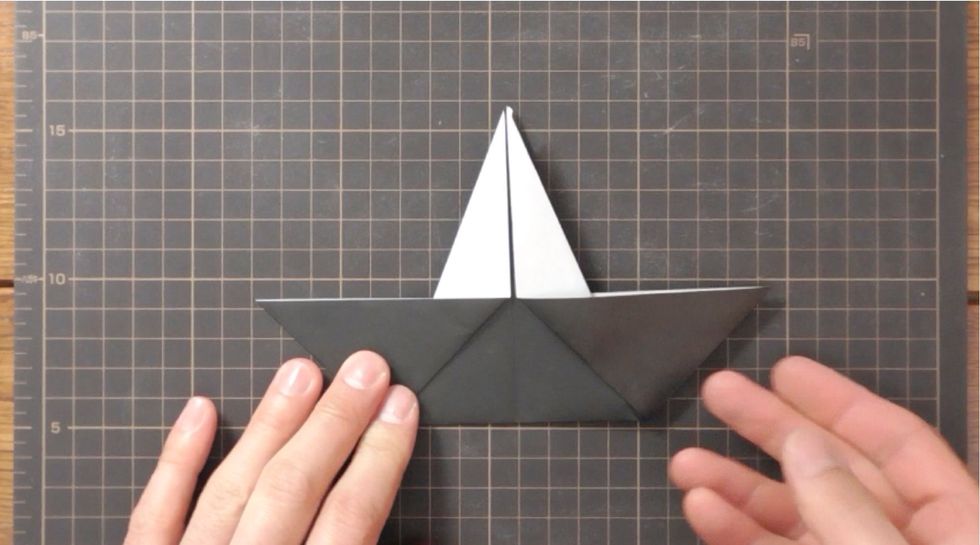 Pull inner layer out. Pull points out to fullest extent.