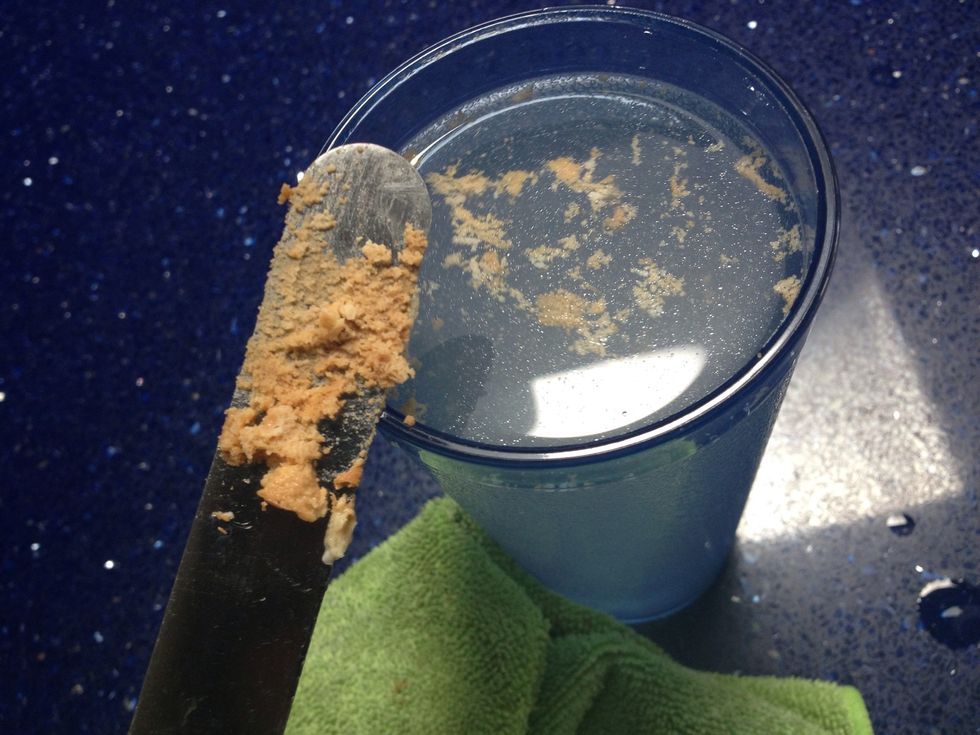 Pull it out every few inches and clean it off, did that in the water wipe it on the rag.