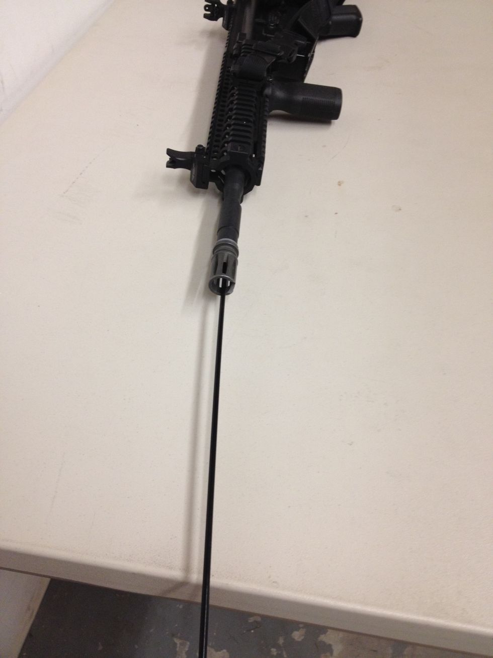 Pull it out to the end of the barrel and repeat this process a few times.